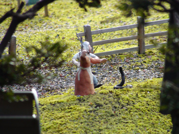 Old Hobart Town Figurine Lady Killing Snake